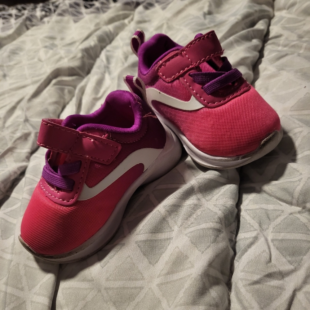 Pink and purple baby shoes